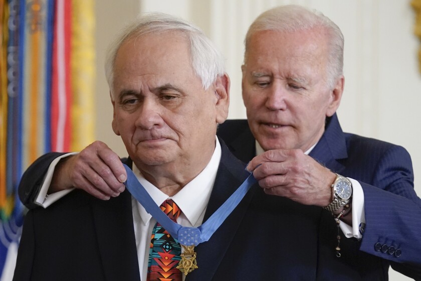 President Joe Biden awards the Medal of Honor to Spc. Dwight Birdwell for his actions on Jan. 31, 1968, during the Vietnam War, during a ceremony in the East Room of the White House, Tuesday, July 5, 2022, in Washington. (AP Photo/Evan Vucci)