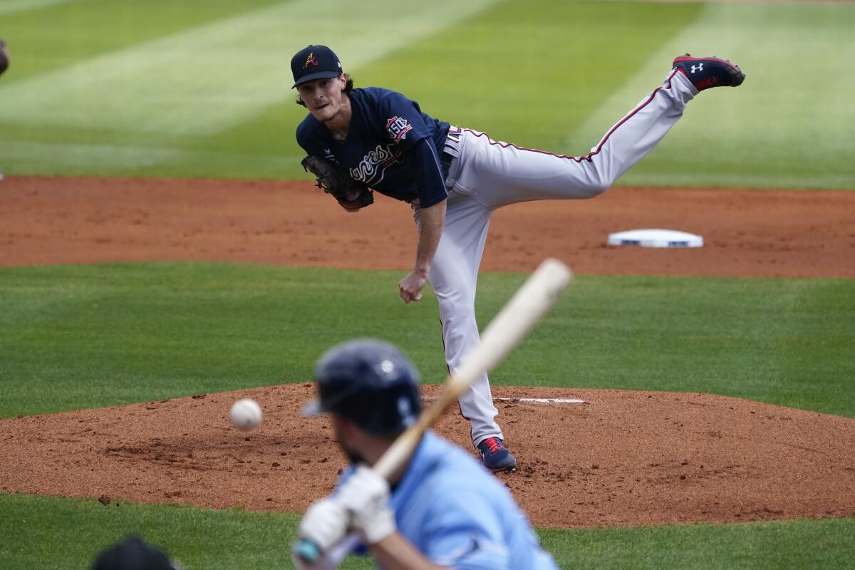 Atlanta Braves' Max Fried pitches against the Tampa Bay Rays during a spring training game.