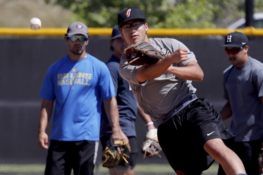 IRVINE, CALIF. - JULY 8, 2020. Minor league players work out at a field in the Great American Park in Irvine.