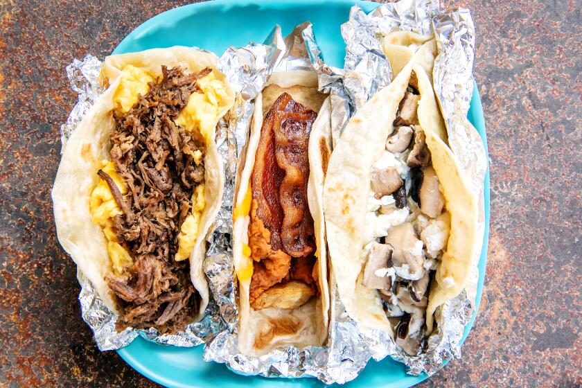 LOS ANGELES, CA - OCTOBER 20: Breakfast tacos from HomeState including (from left to right) Pecos, Don't Mess with Texas and Blanco taken in the outside patio of HomeState on Tuesday, Oct. 20, 2020 in Los Angeles, CA. (Mariah Tauger / Los Angeles Times)