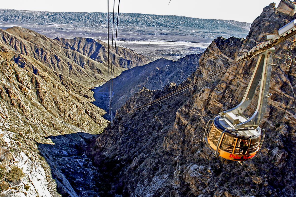 The Palm Springs Aerial Tramway glides above the mountains. 