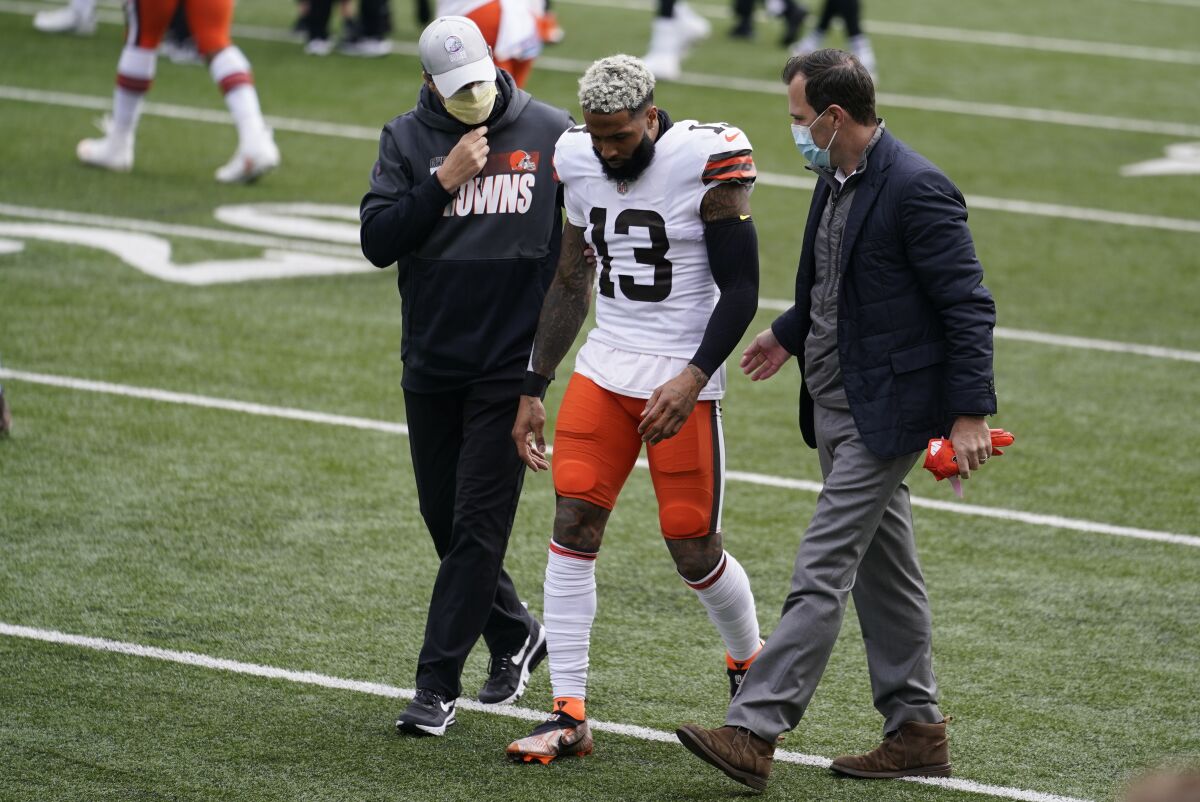 Cleveland Browns wide receiver Odell Beckham Jr. is helped off the field in the first half 