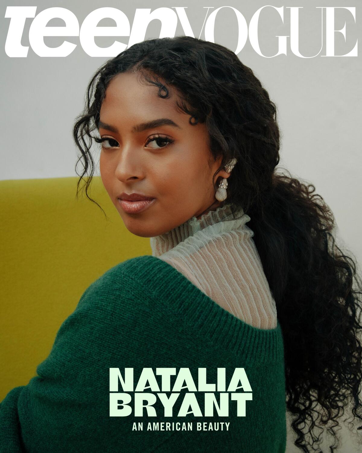 Natalia Bryant with long, black hair posing on a Teen Vogue magazine cover