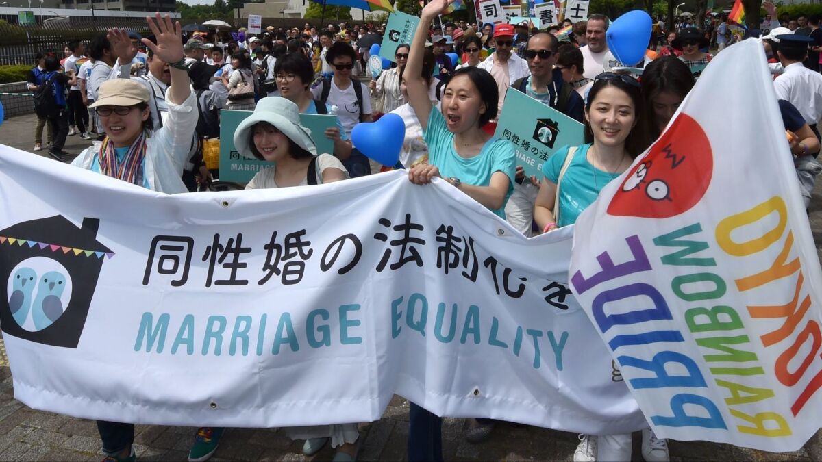 People march in the Rainbow Pride parade in Tokyo on May 7, 2017. (Kazuhiro Nogi / AFP/Getty Images)