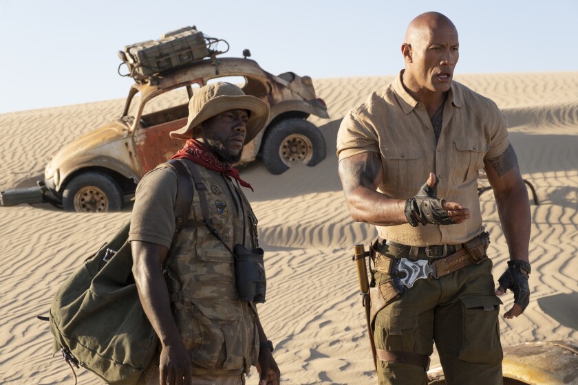 Kevin Hart and Dwayne Johnson in the movie "Jumanji: The Next Level."