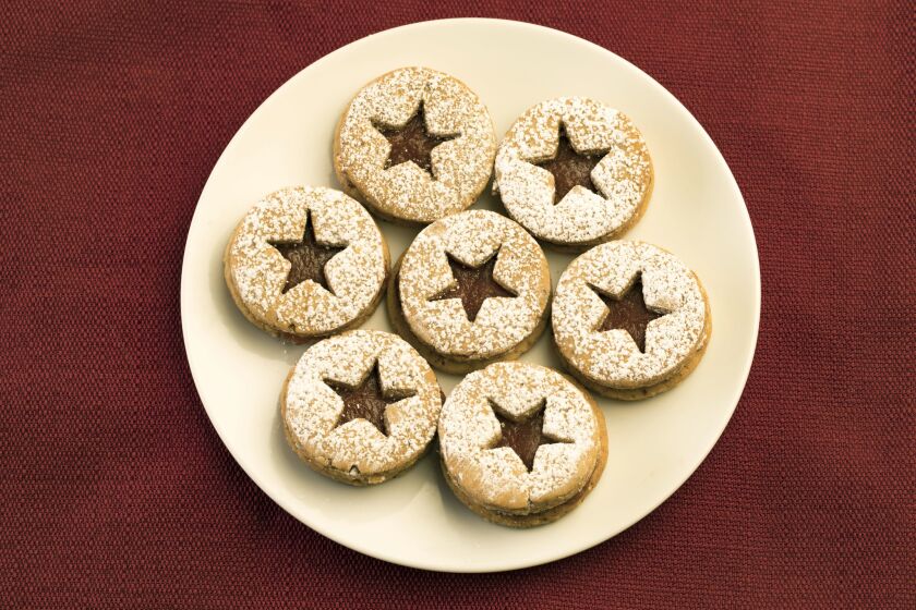 Linzer cookies with persimmon filling made in the Los Angeles Times Test Kitchen. Adapted from a recipe by Alice Nishimoto.