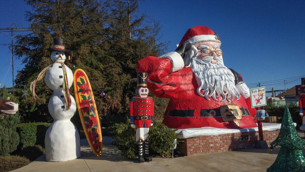 Nov. 29, 2015:. The cleaned-up statue sits at Santa Park in Nyeland Acres next to the 101 Freeway near Oxnard. During the summer, Santa wears sunglasses.