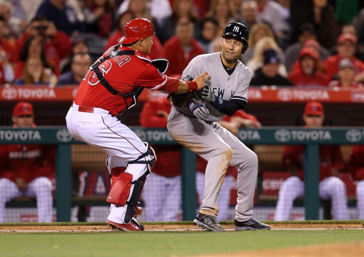 Derek Jeter loved playing in Angel Stadium, like he did when he was tagged out by Angels catcher Hank Conger in a game on May 6, 2014.