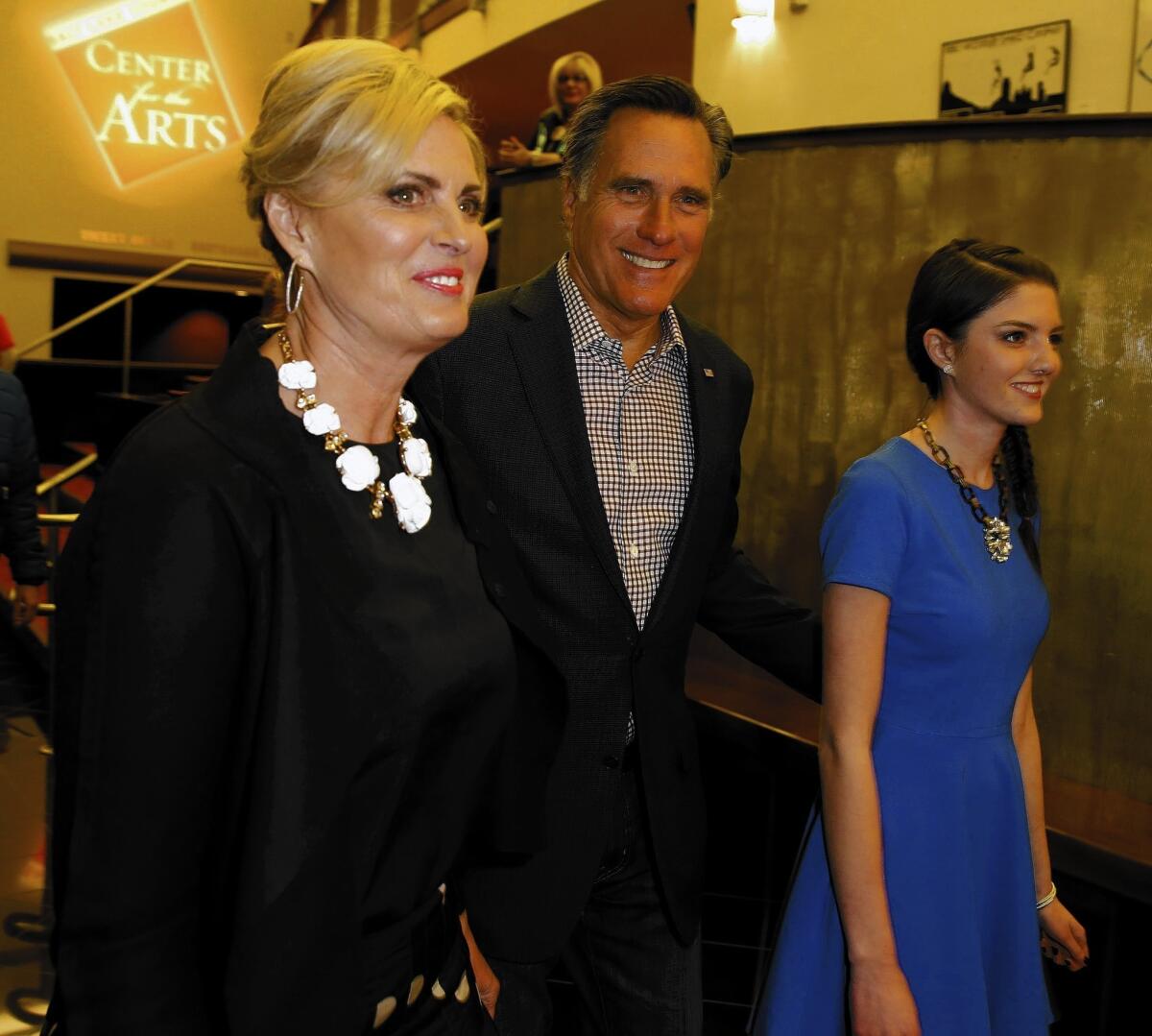 Mitt Romney, with his wife Ann and granddaughter Allie, arrive for the premiere of "Mitt" at the 2014 Sundance Film Festival.