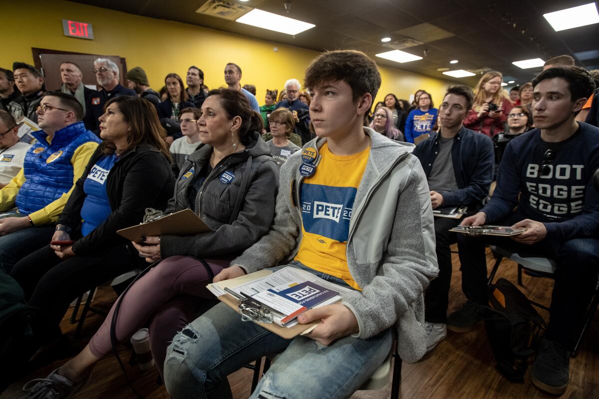 Attendees at a Canvass Kickoff event for former Mayor of South Bend, Indiana Pete Buttigieg as he campaigns to be the 2020 Democratic presidential nominee at the campaign's West Des Moines Field Office in West Des Moines, Iowa.