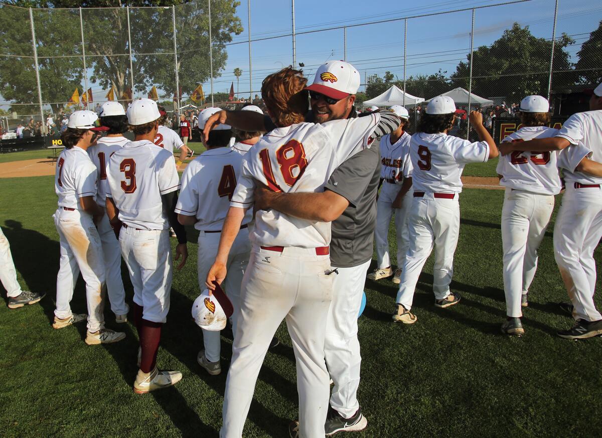 The Estancia baseball team celebrates winning the CIF State Southern California Regional Division V title.