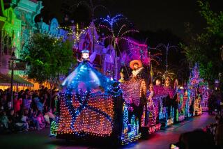 The Main Street Electrical Parade has returned to Disneyland with a new float that represents recent Disney stories.