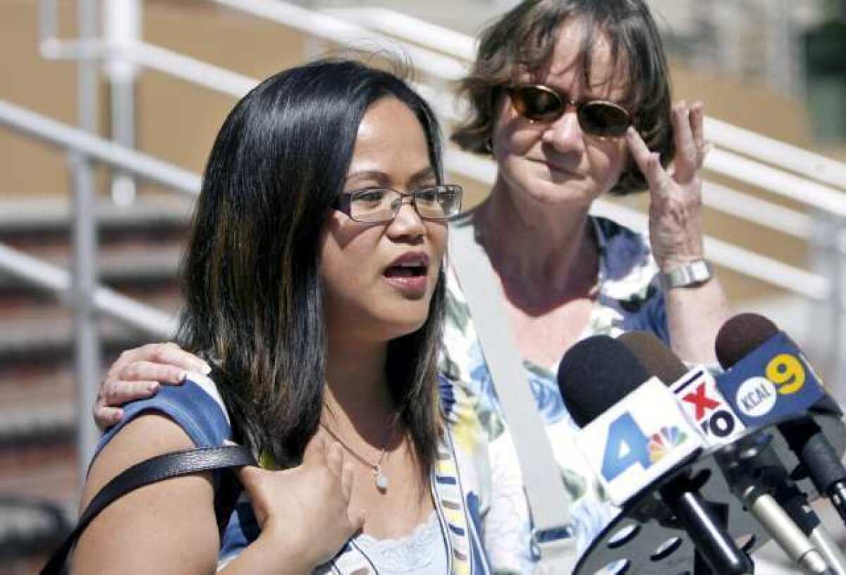 Thea Ivens, wife of missing Burbank FBI agent Stephen Ivens, left, and his mother Catherine Ivens, right, plead for the public's help in finding Stephen Ivens during a family press conference in front of the Burbank Police Dept.