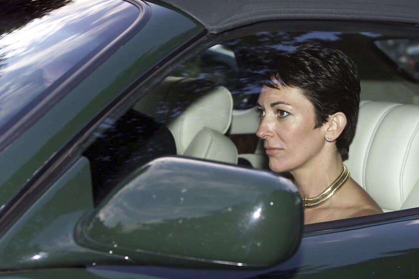 FILE - In this Sept. 2, 2000 file photo, British socialite Ghislaine Maxwell, driven by Britain's Prince Andrew leaves the wedding of a former girlfriend of the prince, Aurelia Cecil, at the Parish Church of St Michael in Compton Chamberlayne near Salisbury, England. after a life of both scandal and luxury, Maxwell's next act will be decided by a U.S. trial. Starting Monday, prosecutors in New York will argue that even as she was sipping cocktails with the likes of Prince Andrew, Bill Clinton and Donald Trump, Maxwell, 59, was secretly abetting Epstein's crimes with girls as young as 14.(Chris Ison/PA via AP, File)