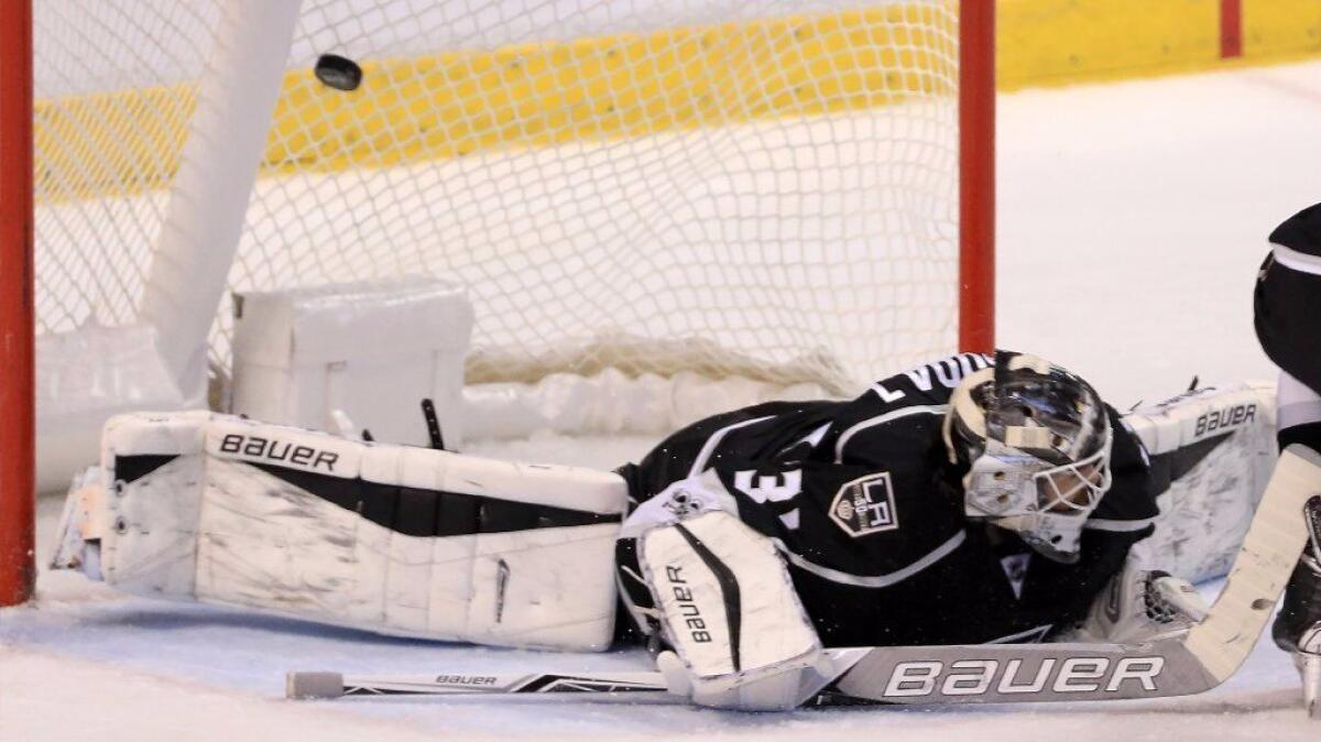 Kings goaltender Peter Budaj gives up a goal during a game against the Florida Panthers on Feb. 9.