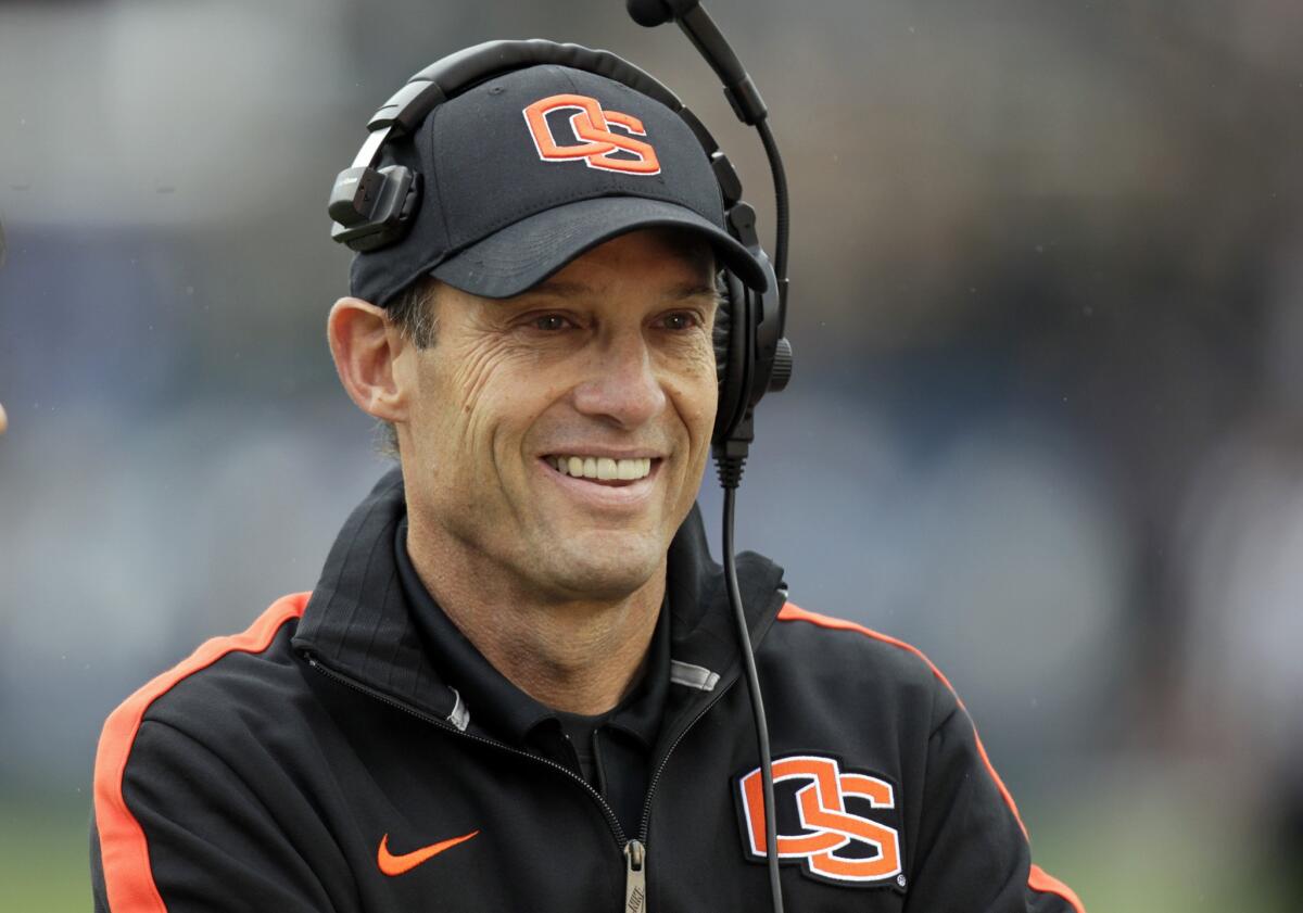 Oregon State Coach Mike Riley has been hired by Nebraska to replace Bo Pelini, who was fired earlier this week.