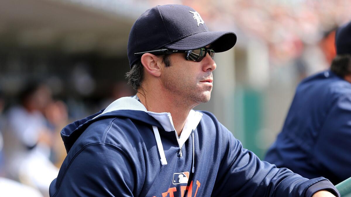 Manager Brad Ausmus watches the Tigers play the Kansas City Royals earlier htis week at Comerica Park in Detroit.
