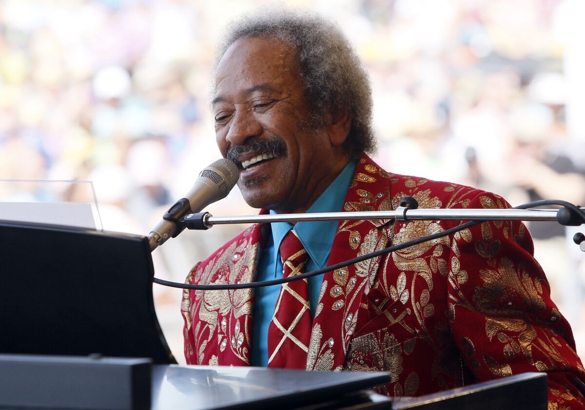 FILE - Allen Toussaint performs at the New Orleans Jazz and Heritage Festival in New Orleans, Saturday, May 7, 2011. A New Orleans city council member is pushing to change a street currently named after Confederate Gen. Robert E. Lee and replace it with one the city’s most famous musicians, Allen Toussaint. (AP Photo/Patrick Semansky, File)