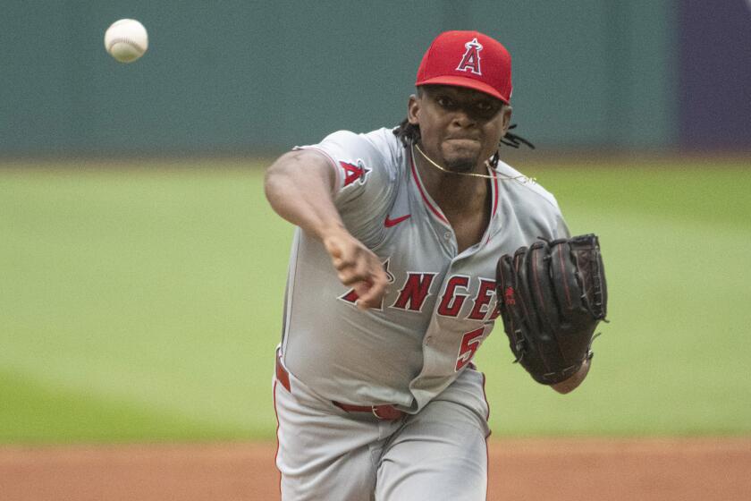 Los Angeles Angels starting pitcher Jose Soriano (59) delivers against the Cleveland Guardians.