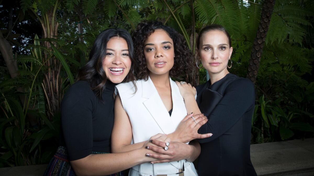 Cast members from "Annihilation": Gina Rodriguez, left, Tessa Thompson and Natalie Portman