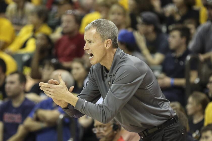 USC Coach Andy Enfield instructs the Trojans against Wichita State on Nov. 26.