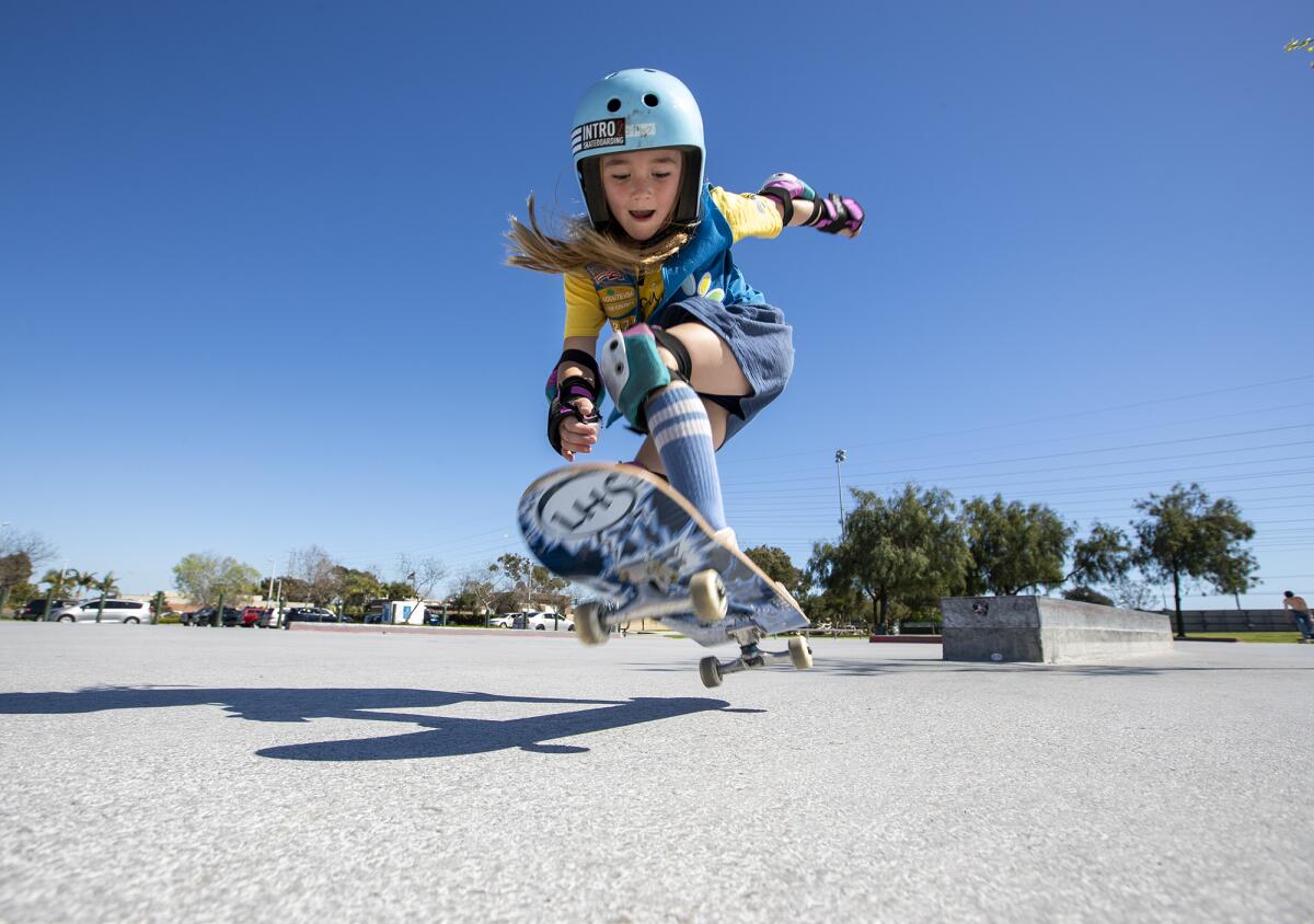 Brooke Benton, 6, skates at Edison Park Skate Spot.