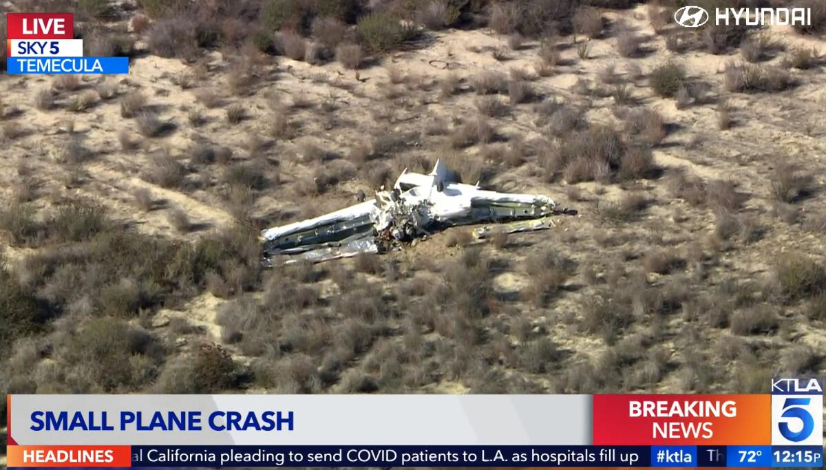 A screen capture shows an image of a plane crash site.