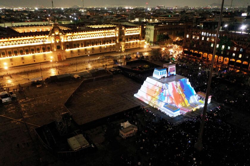 TOPSHOT - Aerial view of a model of a pyramid of ancient Tenochtitlan with a projection for the commemoration of the 500 anniversary of the resistance of Mexico-Tenochtitlan to the Spanish at the Zocalo square Mexico City on August 13, 2021. (Photo by ALFREDO ESTRELLA / AFP) (Photo by ALFREDO ESTRELLA/AFP via Getty Images)