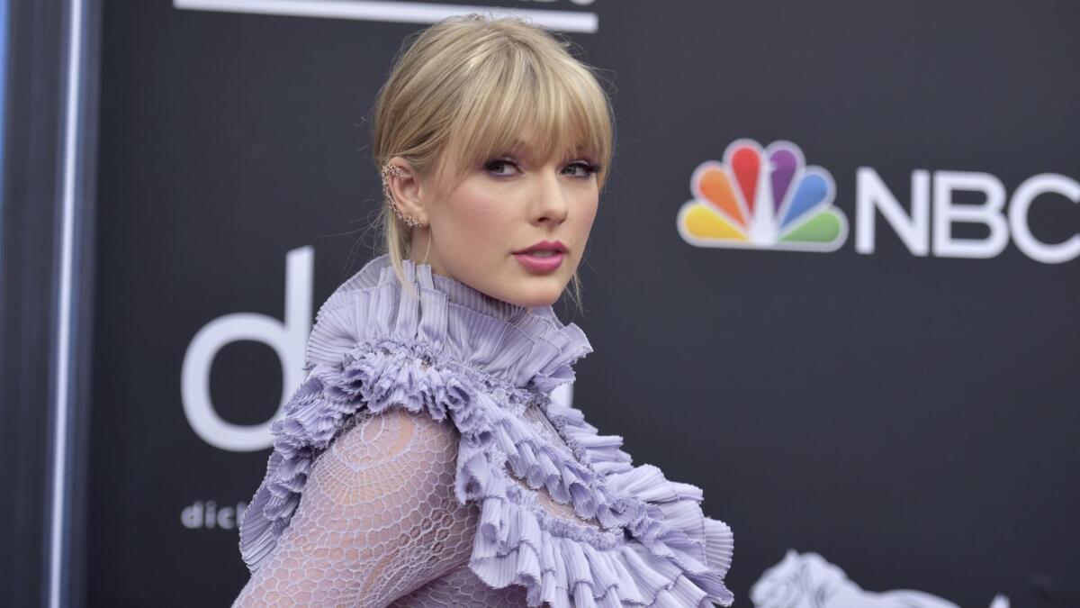 Taylor Swift arrives at the Billboard Music Awards at the MGM Grand Garden Arena in Las Vegas in May.