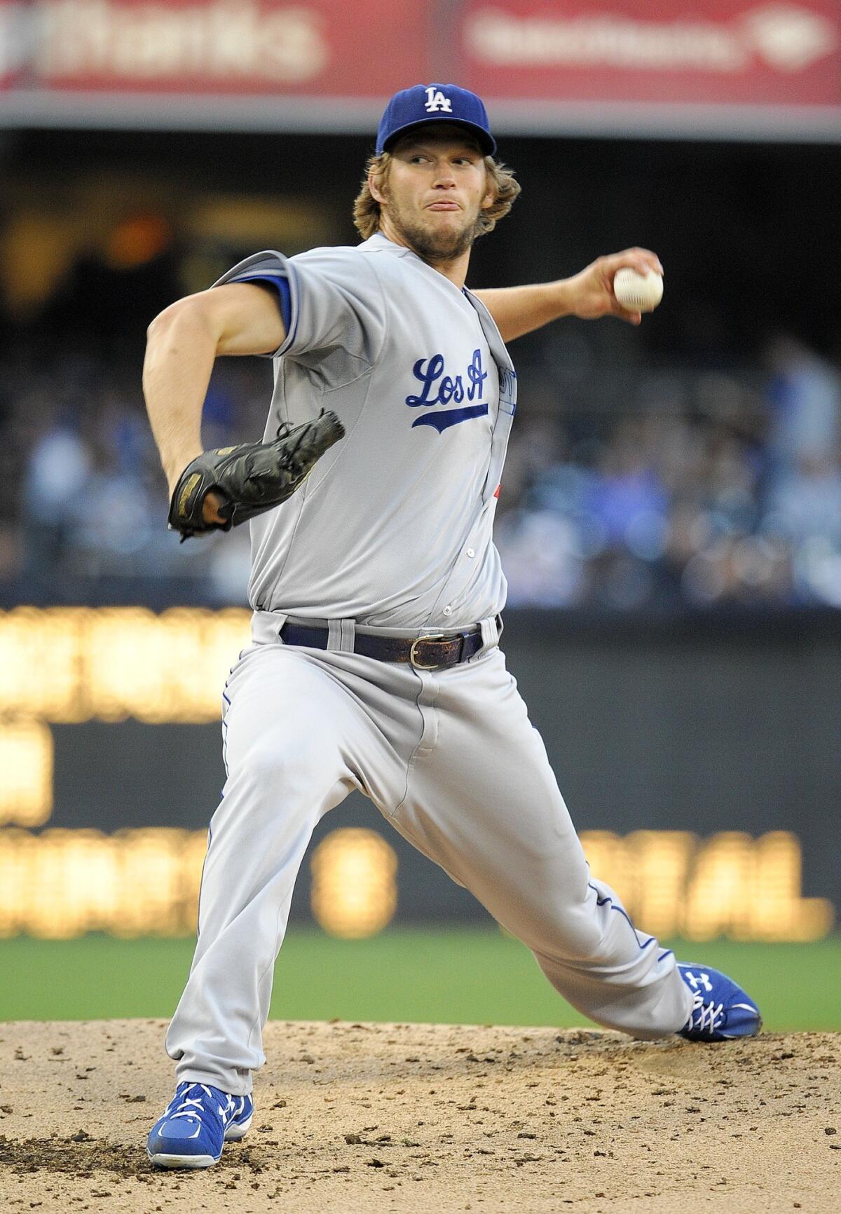 Dodgers starter Clayton Kershaw delivers a pitch during Saturday's win over the San Diego Padres.