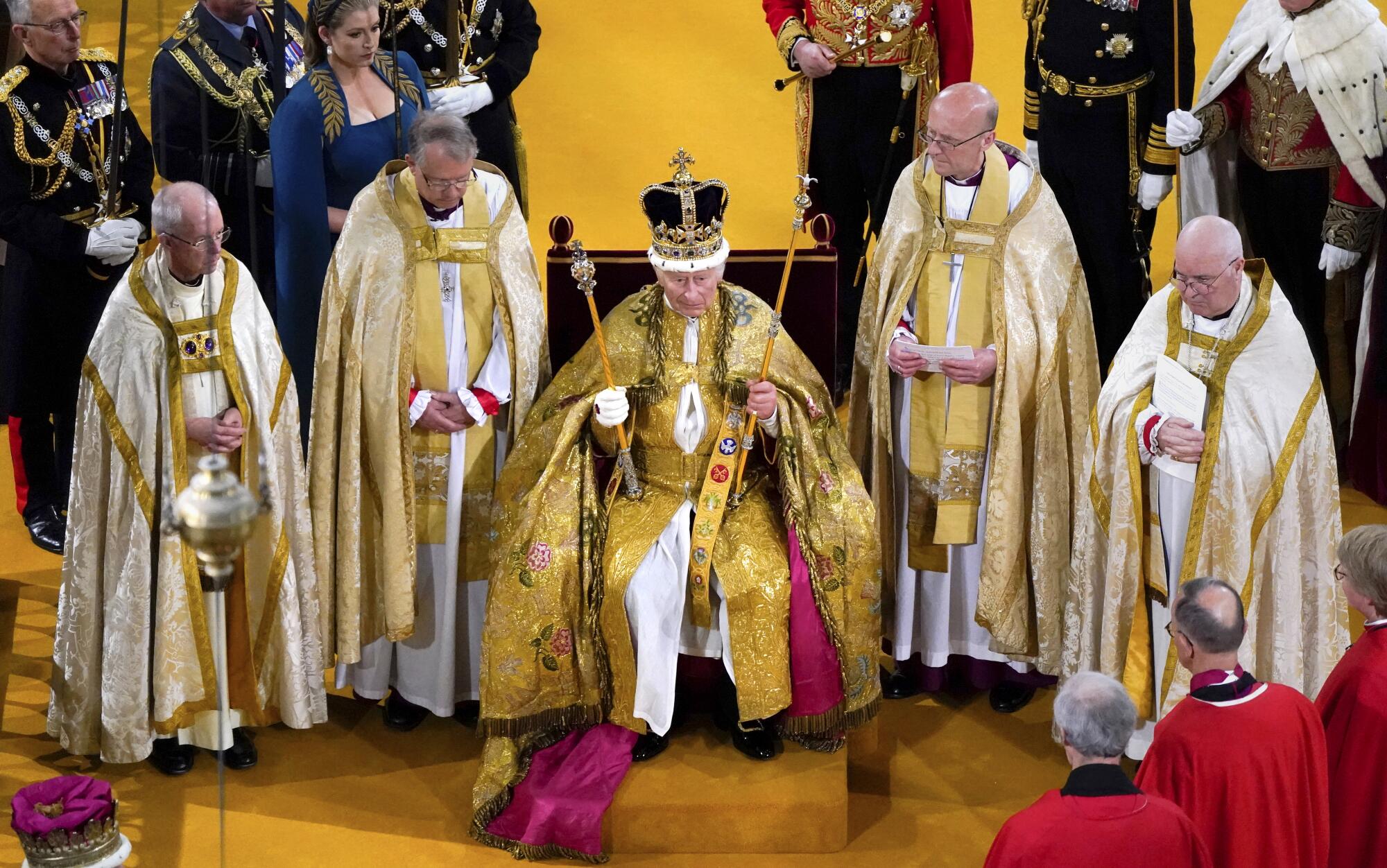 Britain's King Charles III wears St. Edward's Crown during his coronation at Westminster Abbey.