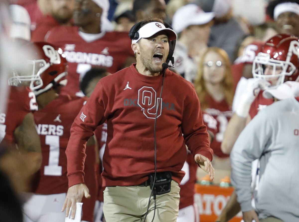 FILE - Oklahoma head coach Lincoln Riley yells to his team before a play during the first half of an NCAA college football game against TCU, Saturday, Oct. 16, 2021, in Norman, Okla. No. 4 Oklahoma plays at No. 18 Baylor on Saturday, Nov. 13. (AP Photo/Alonzo Adams, File)