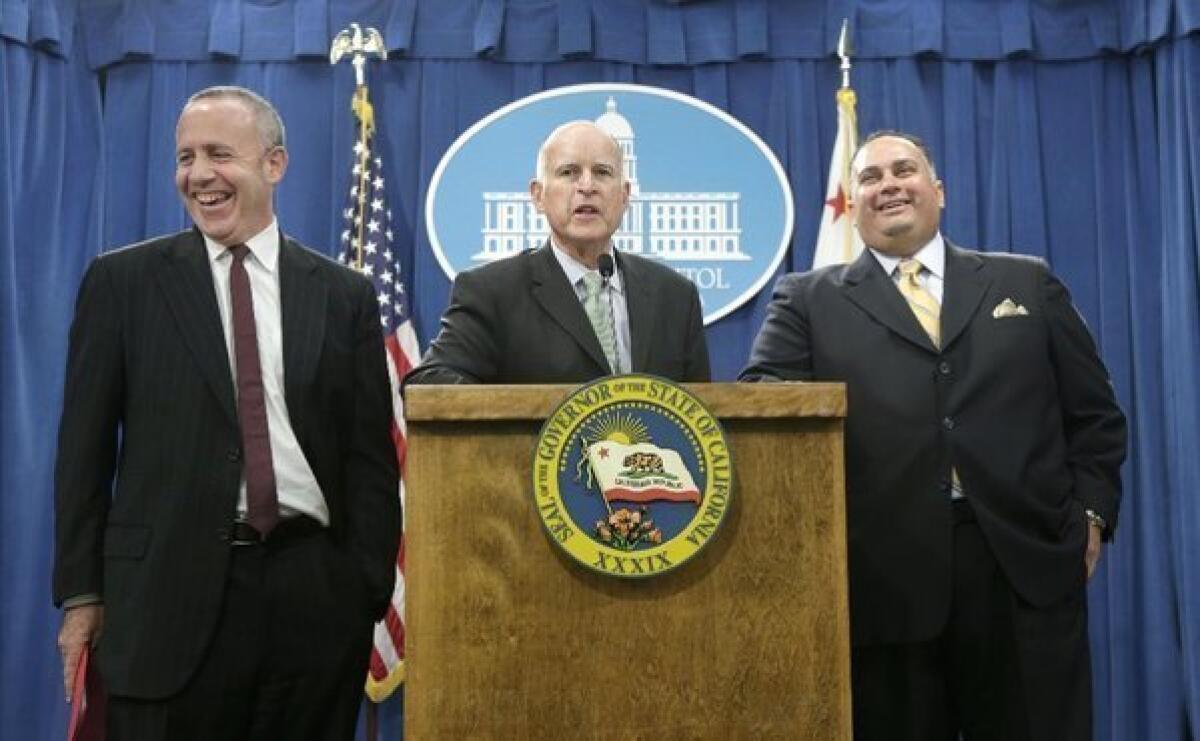 From left, State Senate President Pro Tem Darrell Steinberg (D-Sacramento), Gov. Jerry Brown and Assembly Speaker John Perez (D-Los Angeles) discuss the California budget during a Capitol news conference in Sacramento last week.