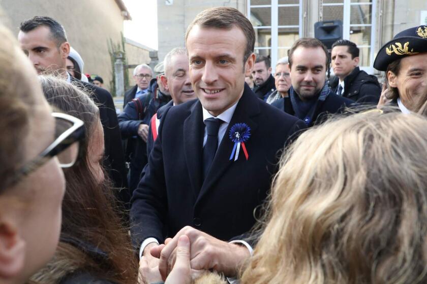 French President (C) meets residents as he arrives in Les Eparges, eastern France on November 6, 2018 during the celebrations of the centenary of the First World War. - French President Emmanuel Macron called on November 6 for a "real European army" as the continent marks a century since the divisions of World War I, to better defend itself against Russia and even the United States. (Photo by ludovic MARIN / AFP)LUDOVIC MARIN/AFP/Getty Images ** OUTS - ELSENT, FPG, CM - OUTS * NM, PH, VA if sourced by CT, LA or MoD **