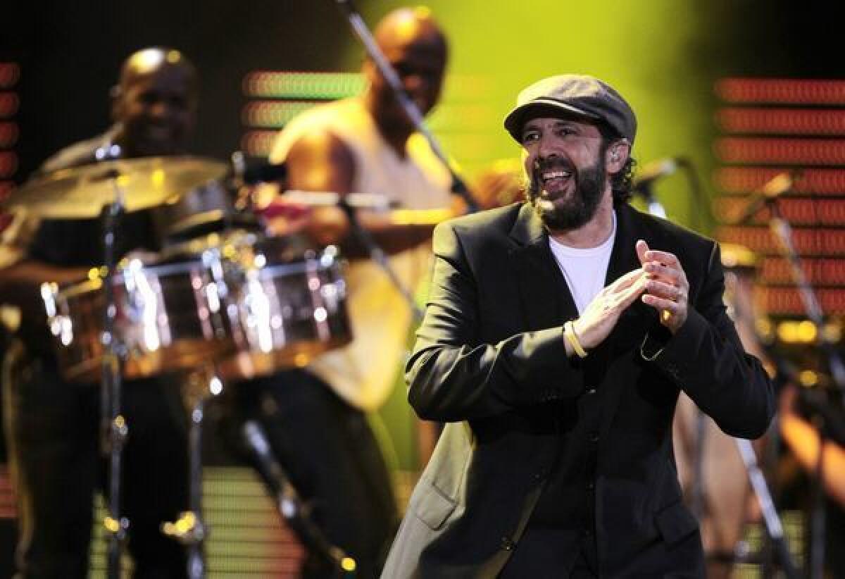 Dominican Republic singer Juan Luis Guerra, shown performing at the 53rd annual Vina del Mar International Song Festival in Vina del Mar, Chile, earlier this year, tops the list of the 2012 Latin Grammy nominees with six nominations, including song of the year and record of the year.