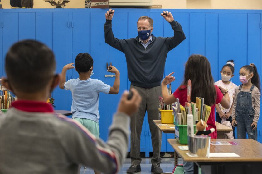 ARLETA, CA - APRIL 20: LAUSD superintendent Austin Beutner dances with Canterbury Avenue Elementary School first graders on Tuesday, April 20, 2021 in Arleta, CA. (Brian van der Brug / Los Angeles Times)