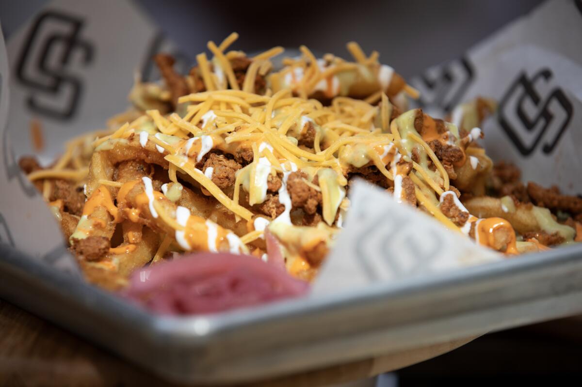 Loaded fries at The Draft by Ballast Point in Section 105 of Petco Park.
