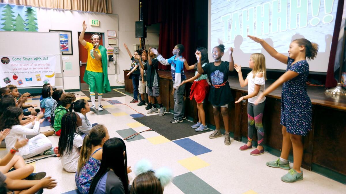 Walt Disney Elementary fourth- and fifth-grade students learned about the environment during an assembly with Mr. Eco at the Burbank school on Tuesday.