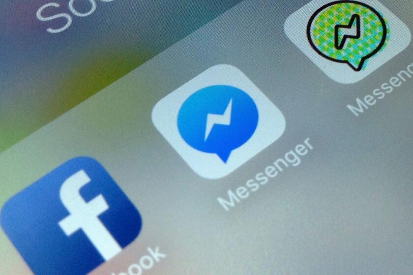 This photo shows application icons from left, Facebook, Facebook Messenger and Messenger Kids on an iPhone in New York, Friday, Feb. 16, 2018. Messenger Kids lets kids under 13 chat with friends and family. It displays no ads and lets parents approve who their children message. (AP Photo)