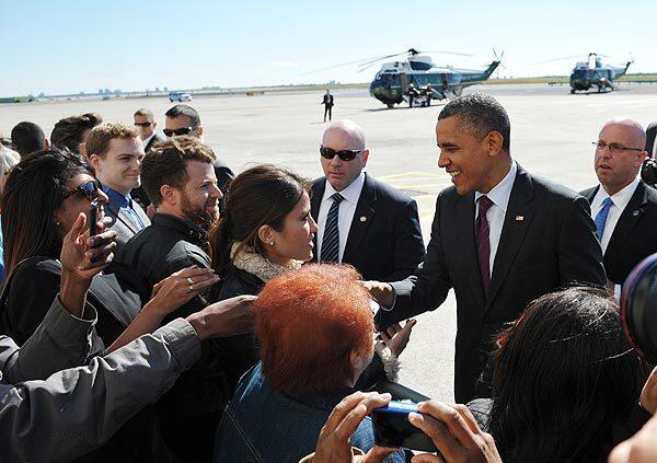 U.S. President Barack Obama greets supporters