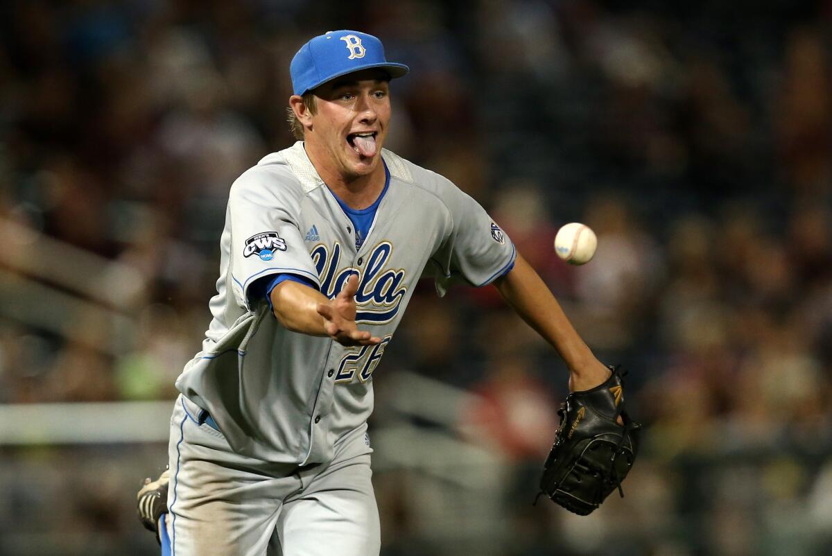 UCLA pitcher David Berg is among three Bruins players named to pre-season All-American team.