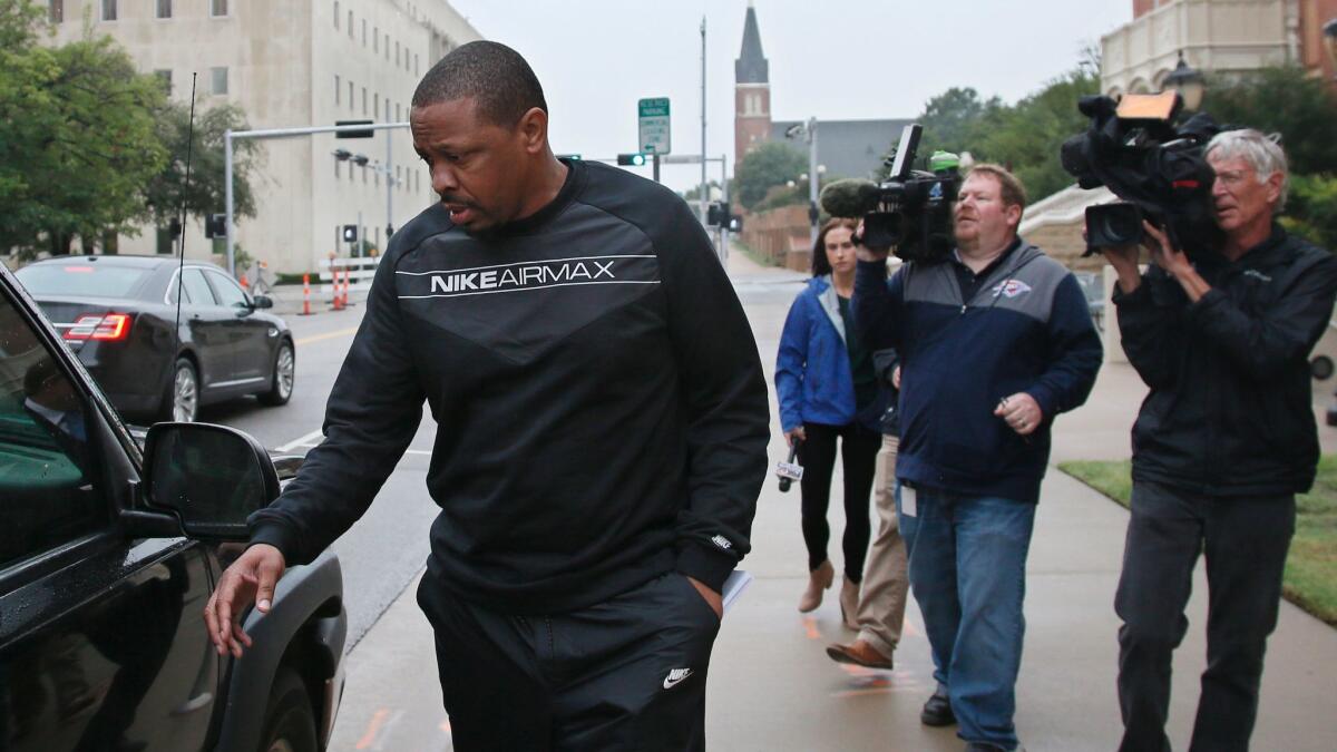 Former Oklahoma State assistant basketball coach Lamont Evans leaves the federal courthouse in Oklahoma City after a court appearance on Sept. 27.