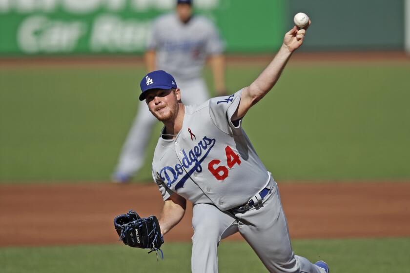 Los Angeles Dodgers pitcher Caleb Ferguson works against the San Francisco Giants during the first inning of the second game of a baseball doubleheader Thursday, Aug. 27, 2020, in San Francisco. (AP Photo/Ben Margot)