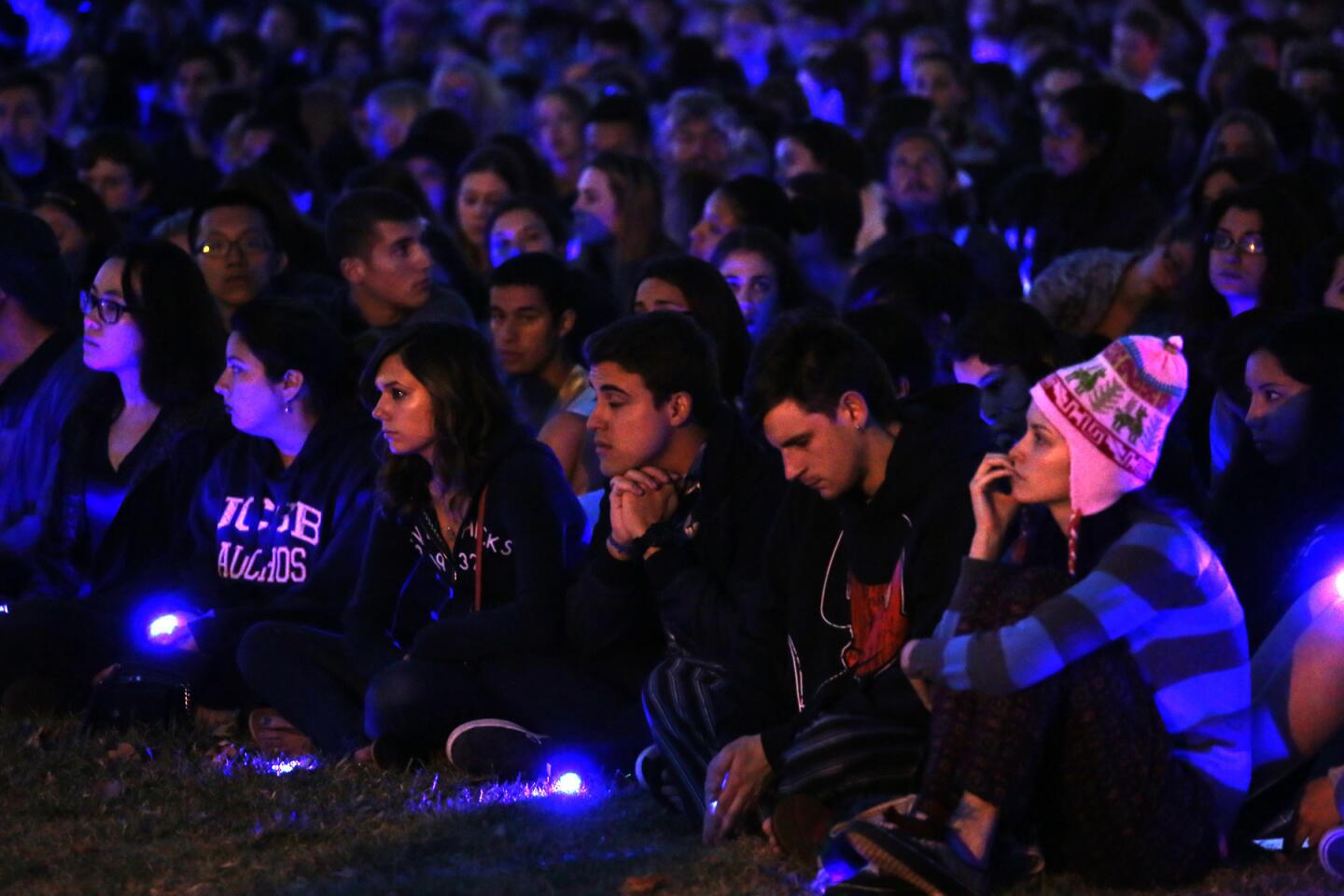UC Santa Barbara students and residents listen during the memorial ceremony, which began at dusk on May 23.