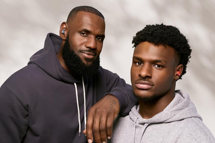 Bronny James (right) with father LeBron James, both now brand ambassadors for Beats by Dre.