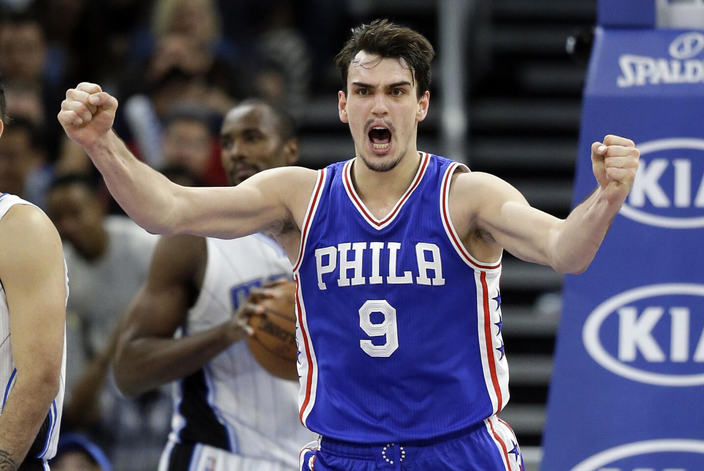 Philadelphia 76ers' Dario Saric (9) reacts after sinking a basket against the Orlando Magic during the final moments of an NBA basketball game, Thursday, Feb. 9, 2017, in Orlando.