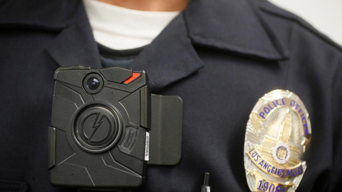 A Los Angeles Police officer wears a body camera during a demonstration of the devices in January of 2014.