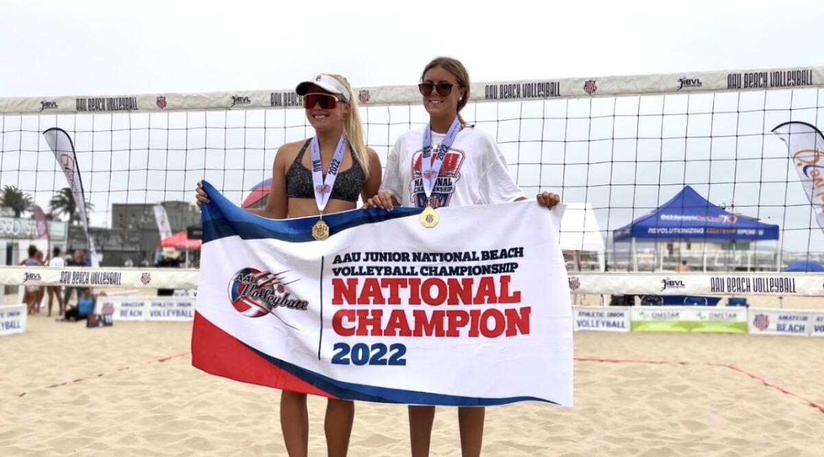 Erin Inskeep, right, and Ashley Pater celebrate after winning the AAU Beach 18U national championship in Hermosa Beach.