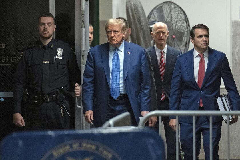 Former President Donald Trump, his attorney Todd Blanche, right, and U.S. Sen Rick Scott, R-Fla., rear center, arrive for Trump's trial at Manhattan Criminal Court, Thursday, May 9, 2024, in New York. (Jeenah Moon/Pool Photo via AP)
