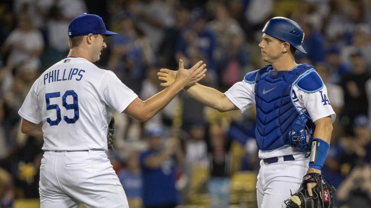 Dodgers bullpen holds Nationals down, LA breaks away late for
